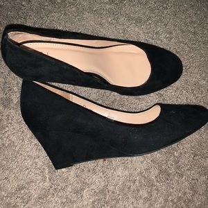 Black closed toe wedge